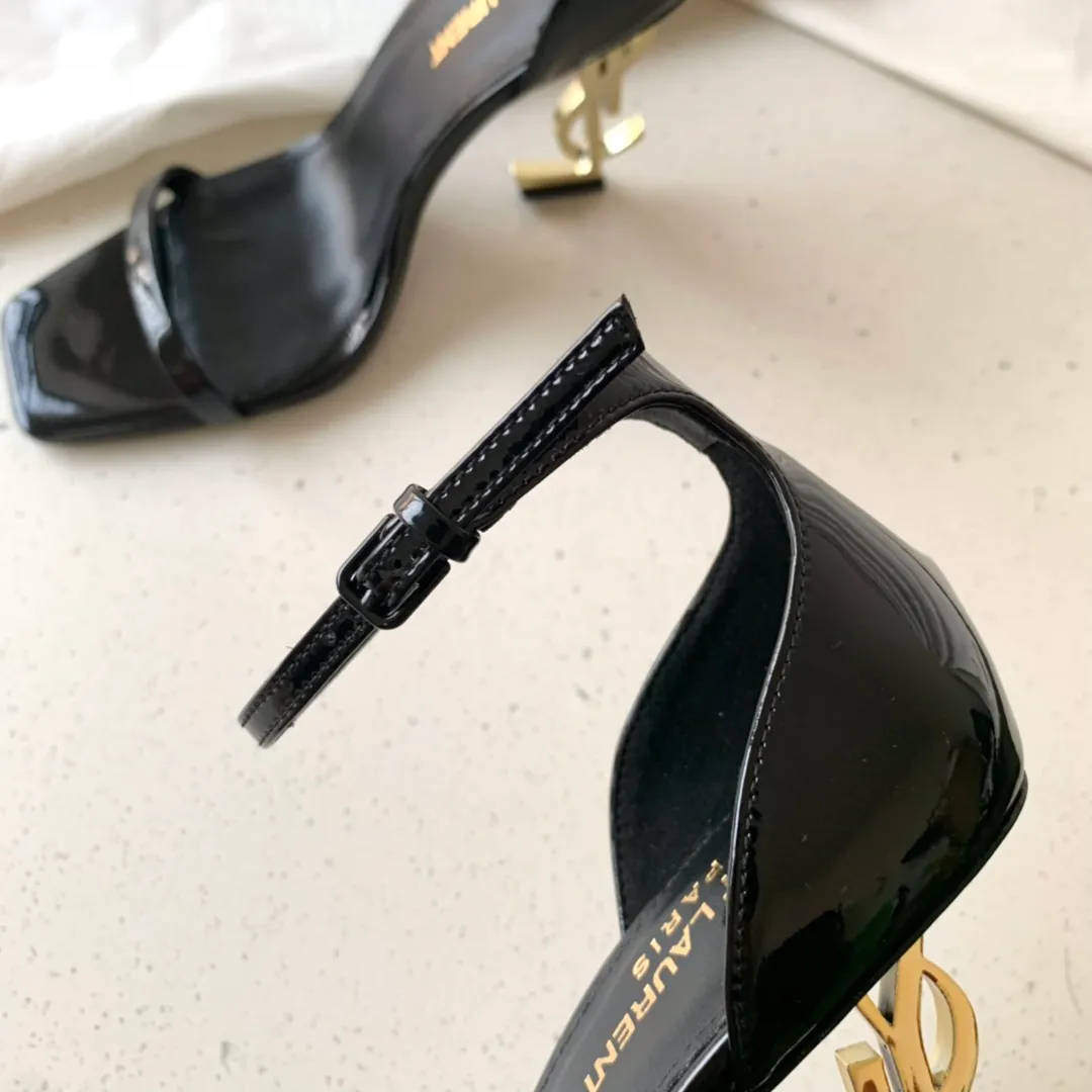 👟👟Ex-factory price 520👟👟 SAINT LAUREN*" Saint Laurent YSL classic one-word high-heeled sandals with logo lettering. Only YSL understands women's hearts best and does not accept refutation. It is a super invincible feminine artifact and a must-have for women (✅Z product full body customization, own molded toe hardware, perfect consistency) Upper: Customized imported cotton silk fabric/imported calf patent leather Inner lining: imported 🐑 sheepskin Sole: imported genuine leather outsole Heel height: 9cm Color: black lacquer with silver, black with gold Size: 35-39 (full set of packaging)